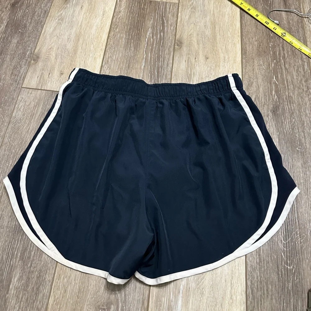 🛍️ Nike dri-fit black with white trimmed shorts great condition.